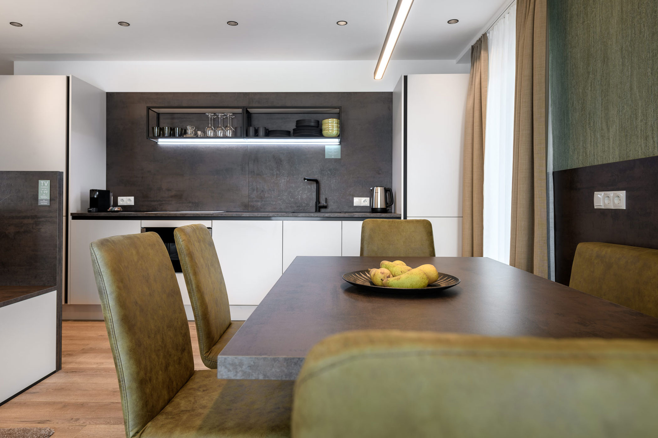 Zona pranzo e cucina dell'appartamento Pipe